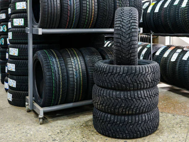 Stack of winter tires ready for a seasonal swap